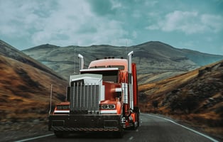 truck driving through the mountains
